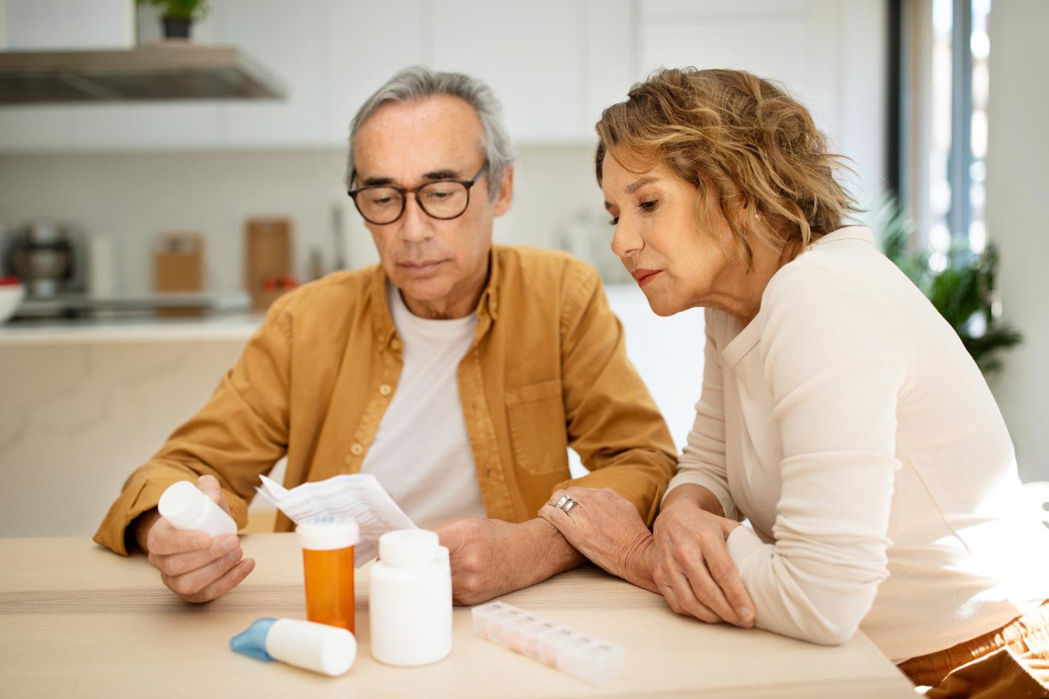 Older couple looking at paperwork