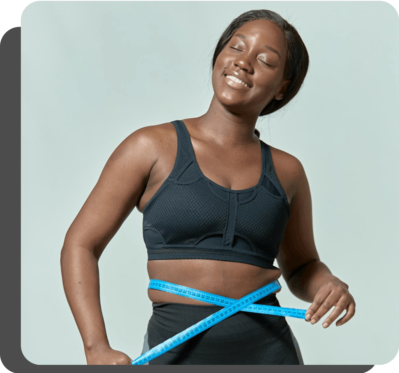 woman holding tape measure